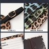 Leopard print passport holder featuring card slots and a leather strap.