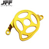 A golden motorcycle engine case protector cover with multiple circular openings.