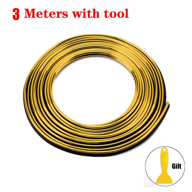 A coil of 3 meters of gold-colored universal car moulding trim strips with a tool.
