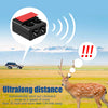 A red ultrasonic warning device is shown next to a deer in an open field.