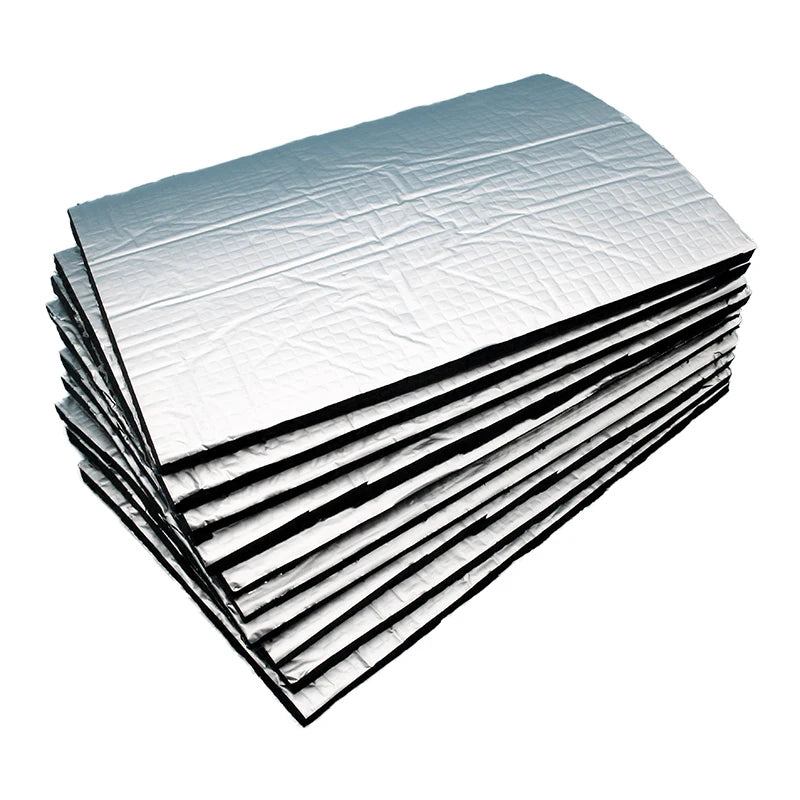 A stack of silver sound deadening mats for automotive use.