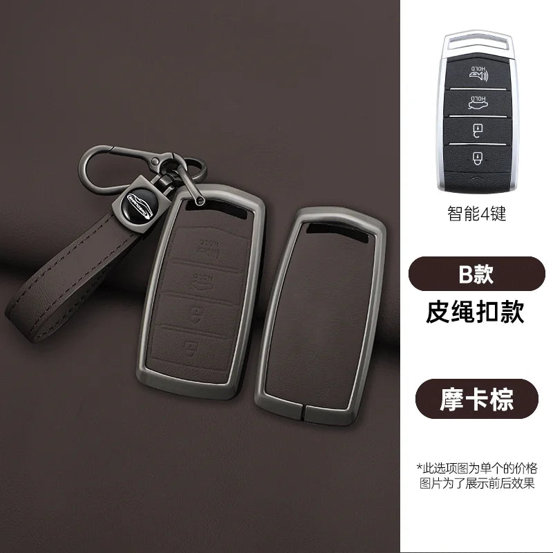 A set of four black zinc alloy car key cases for Hyundai Genesis G70, G80, EQ900, and G90, shown with a leather strap.