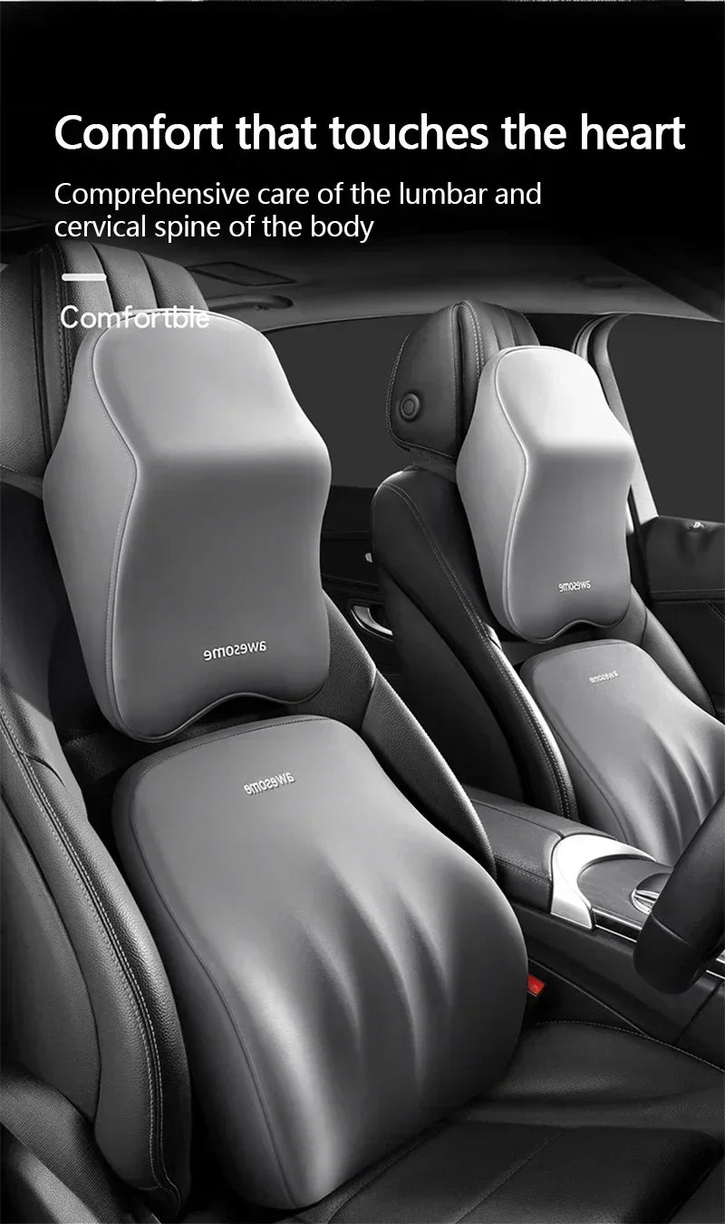 A close-up view of a gray ergonomic car headrest cushion designed for lumbar and cervical spine support.