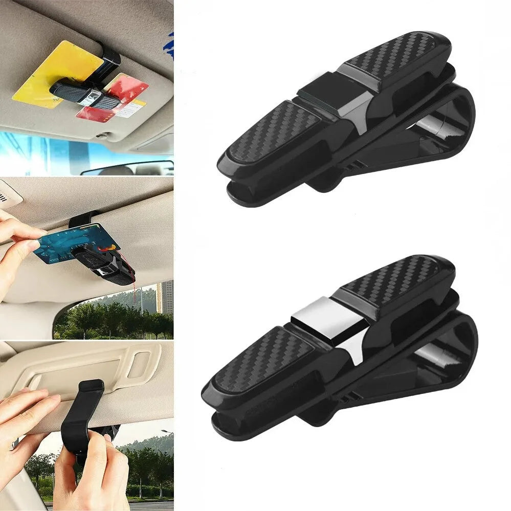 Black textured clip designed to hold sunglasses and eyeglasses in a universal car glass holder.