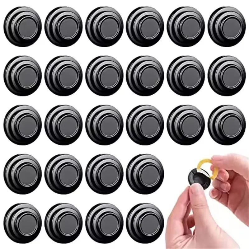A set of ten black silicone car door shock absorber pads for anti-collision bumpers.