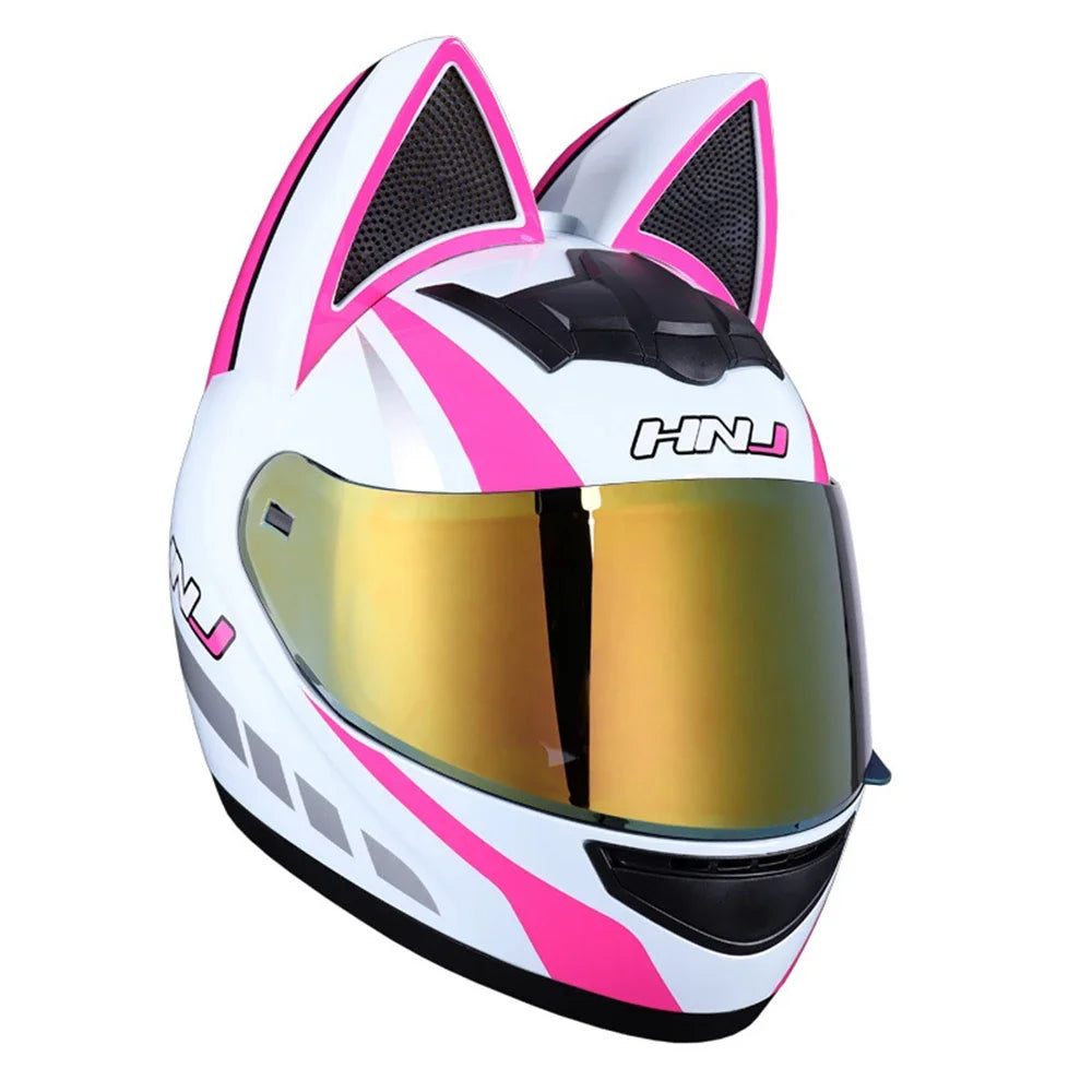 A white and pink cat-ear full face motorcycle helmet with a gold visor.