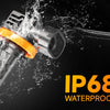 A close-up of an IP68 waterproof automotive LED bulb set being tested under water spray.