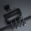 A black retractable car headrest charging cable with multiple electrical connectors lying on a gray surface.
