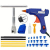 A professional auto dent repair kit showing a heat gun, various tools, and metal rods.