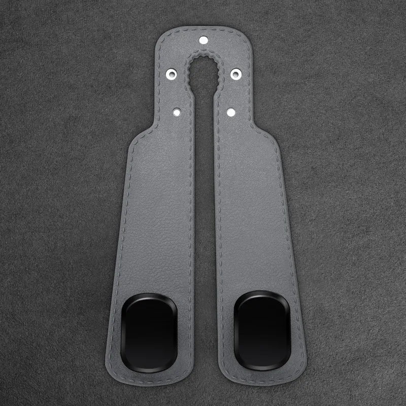 A pair of gray universal car headrest hooks designed for storage organization.