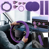 A purple car interior accessory set featuring a steering wheel cover, comfort pads, and seat covers.