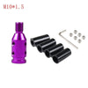 A purple threaded adapter and several black cylindrical components for a gear shift knob.