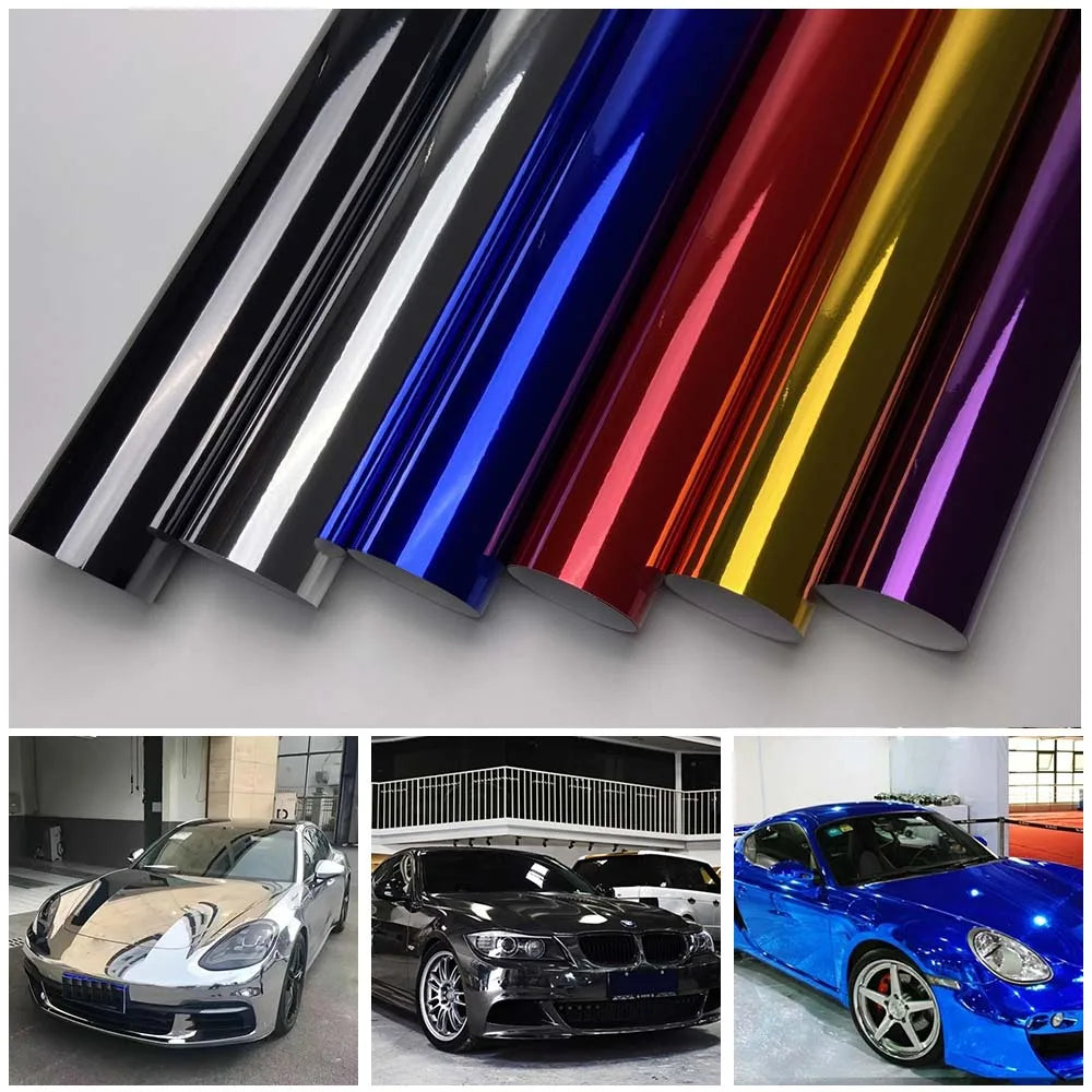 Rolls of multi-color gloss chrome vinyl car wrap film showing various iridescent and metallic colors.