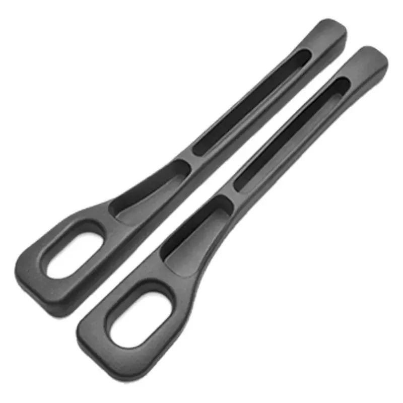 Two black car seat gap plug strips for protection