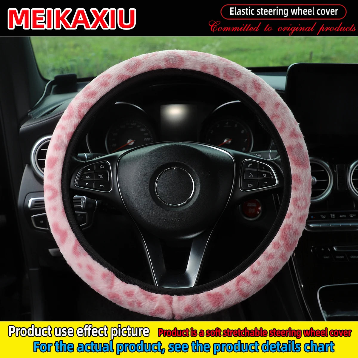 A pink leopard print plush steering wheel cover installed on a black car steering wheel.