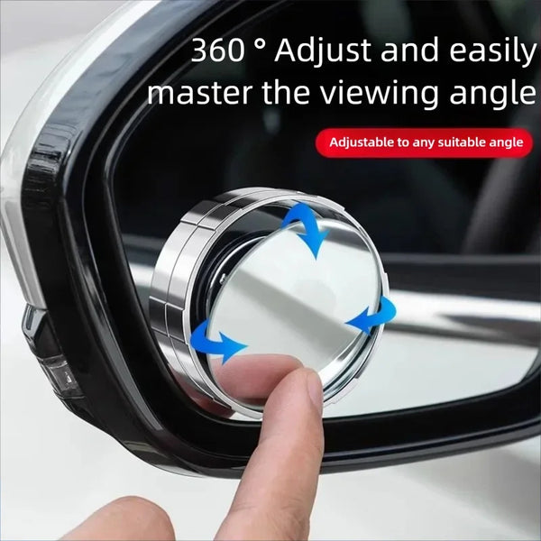 A hand adjusts a 360 degree adjustable car blind spot mirror to change the viewing angle.