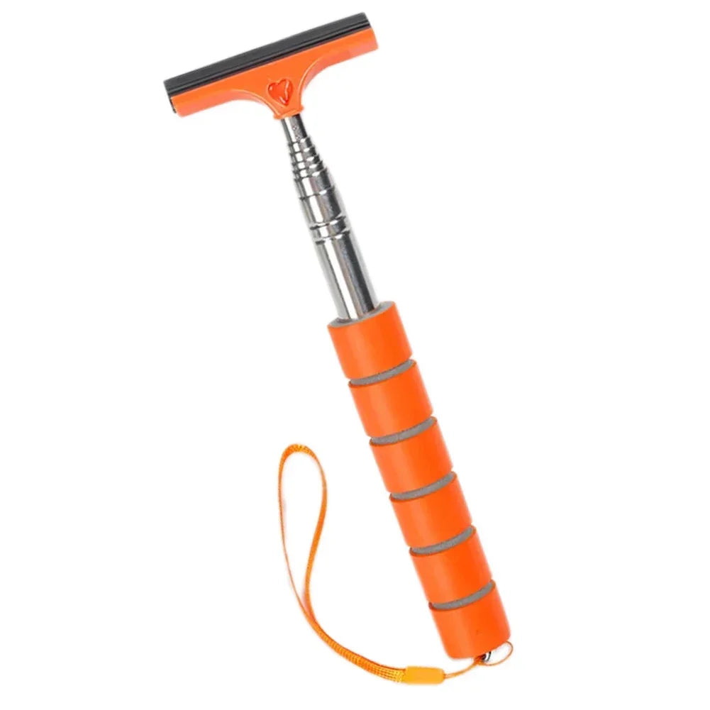An orange telescopic window squeegee with a heart-shaped head and a flexible cord.