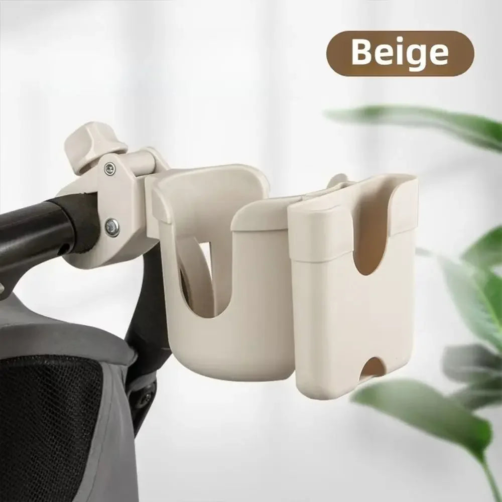 Tasse et support de téléphone beige multifonctionnel fixé au cadre d'une poussette.