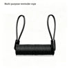 A black multi-purpose reminder rope coiled and looped for securing items.