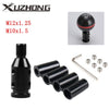 Black universal gear shift knob adapter featuring various thread sizes and a cylindrical adapter body.