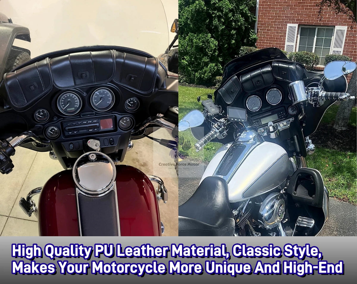 A silver motorcycle with a black leather fairing and storage bag mounted on the front.