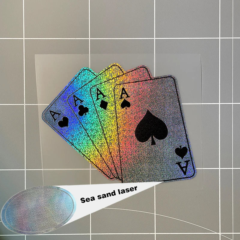 A stack of iridescent poker-themed cards with a sea sand laser effect