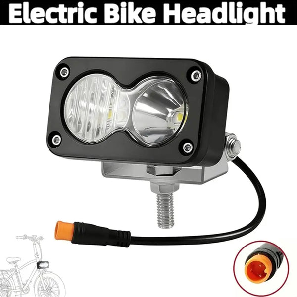 A black electric bike headlight assembly with a clear lens and wiring harness.
