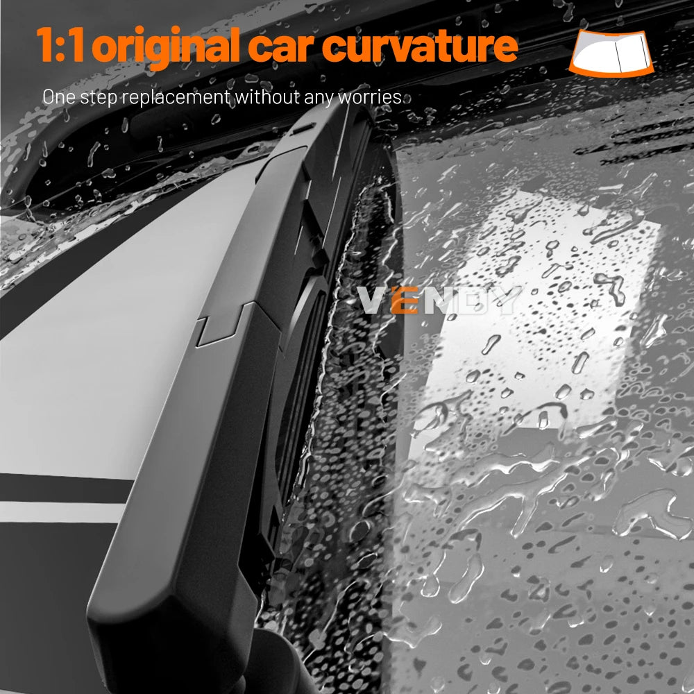 Close-up of a black car windshield wiper blade being replaced on a vehicle.