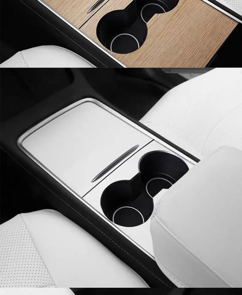 Close-up view of a wood grain dashboard cover for a Tesla Model Y showing a black cup holder and a silver knife.