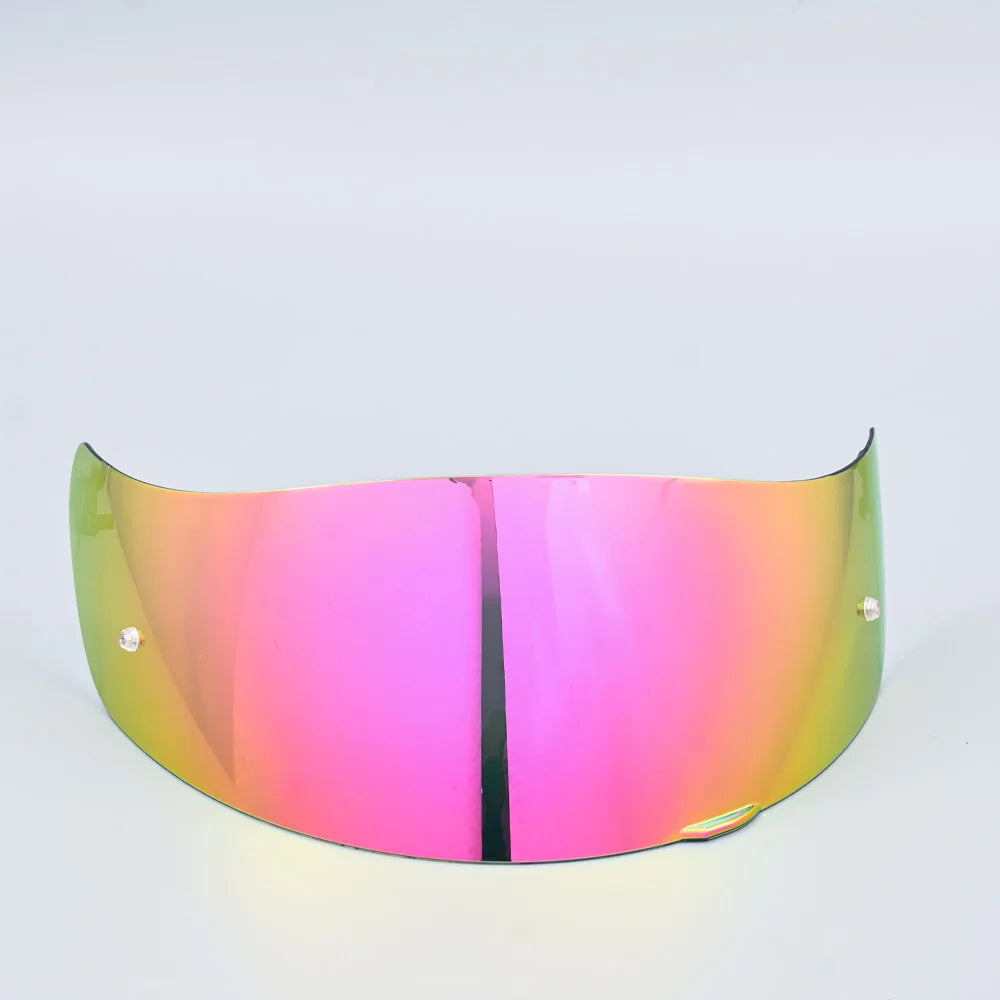 A motorcycle helmet visor with a gradient lens shield showing pink and green colors.