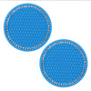 A set of bright blue decorative rhinestone car coasters with a hexagonal pattern.