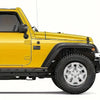 A yellow Jeep Wrangler with matte black 3D American flag decals and off-road tires.