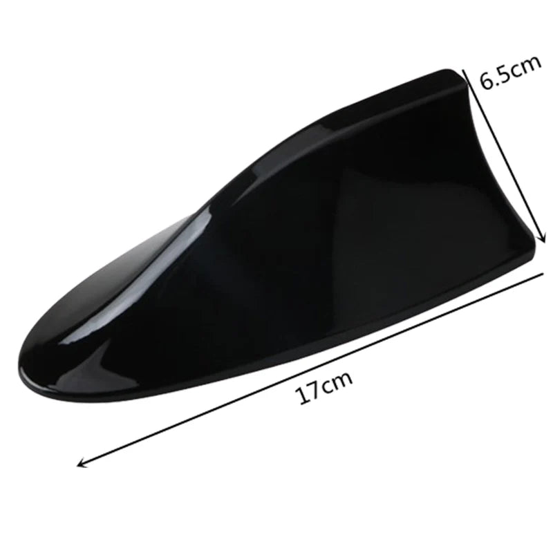 Black carbon fiber look roof mount antenna with dimensions 17cm long and 6.5cm high