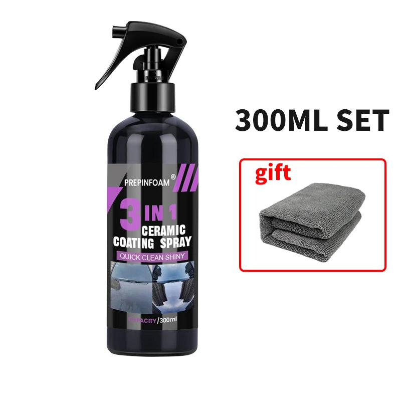 A black bottle of ceramic coating spray with a pump dispenser and a set of three grey microfiber cloths.