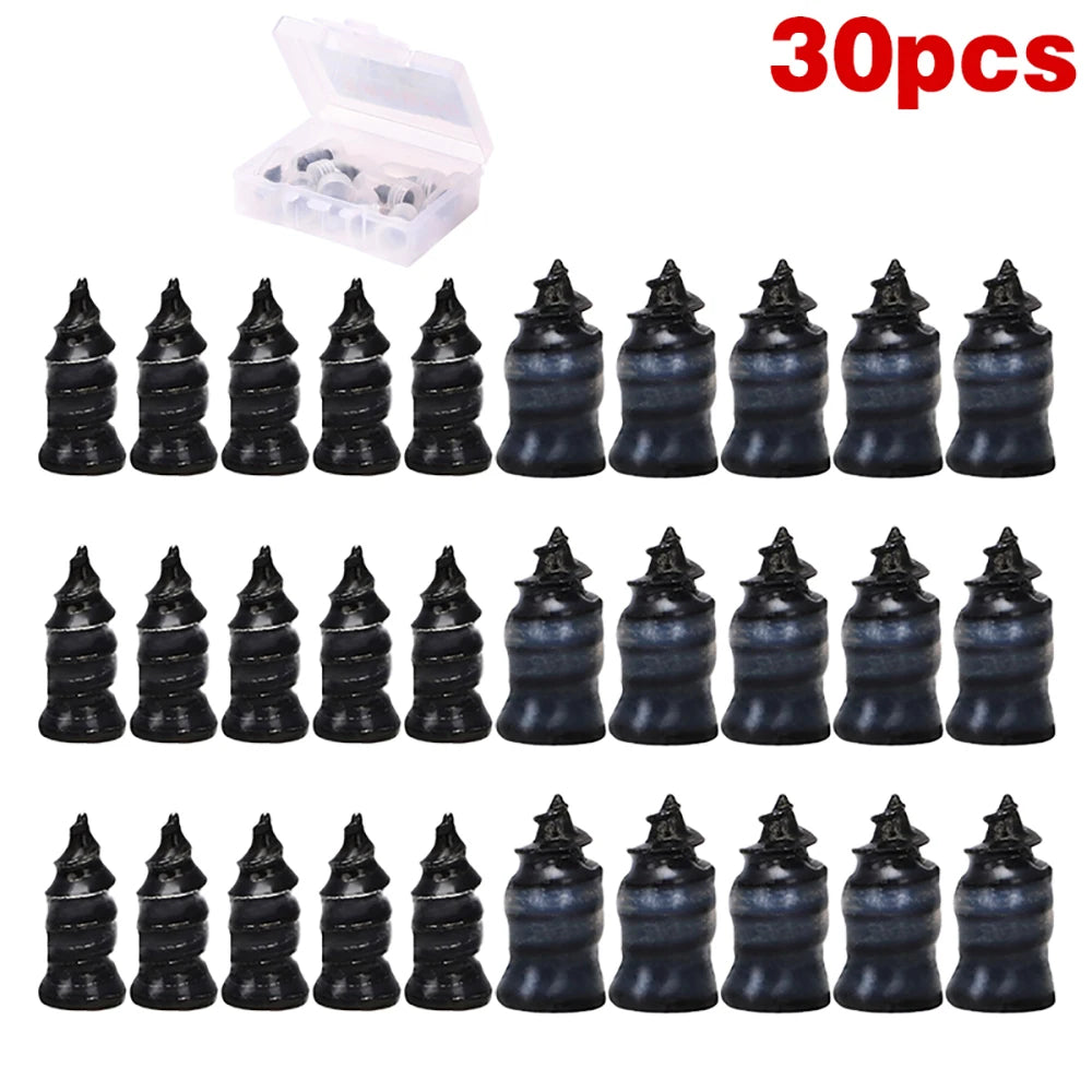 A set of 30 black metal nails and a screwdriver for universal tubeless tire repair.