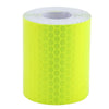 A roll of bright yellow high-visibility reflective tape for vehicles.