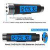 A digital clock and thermometer device with a black casing and blue backlight showing 12:09 and 30.4 degrees.