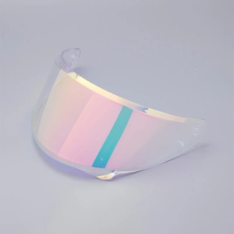 A clear anti-fog visor with a light pink gradient and a vertical teal stripe is shown against a light gray background.
