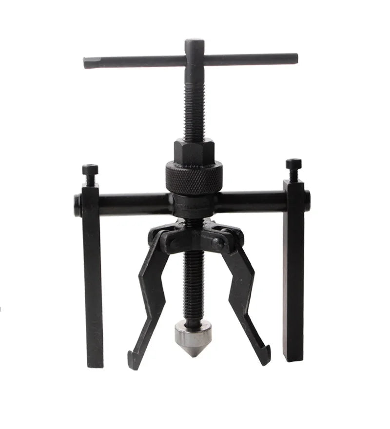 A black three-claw bearing puller tool with a long shaft and gripping arms.