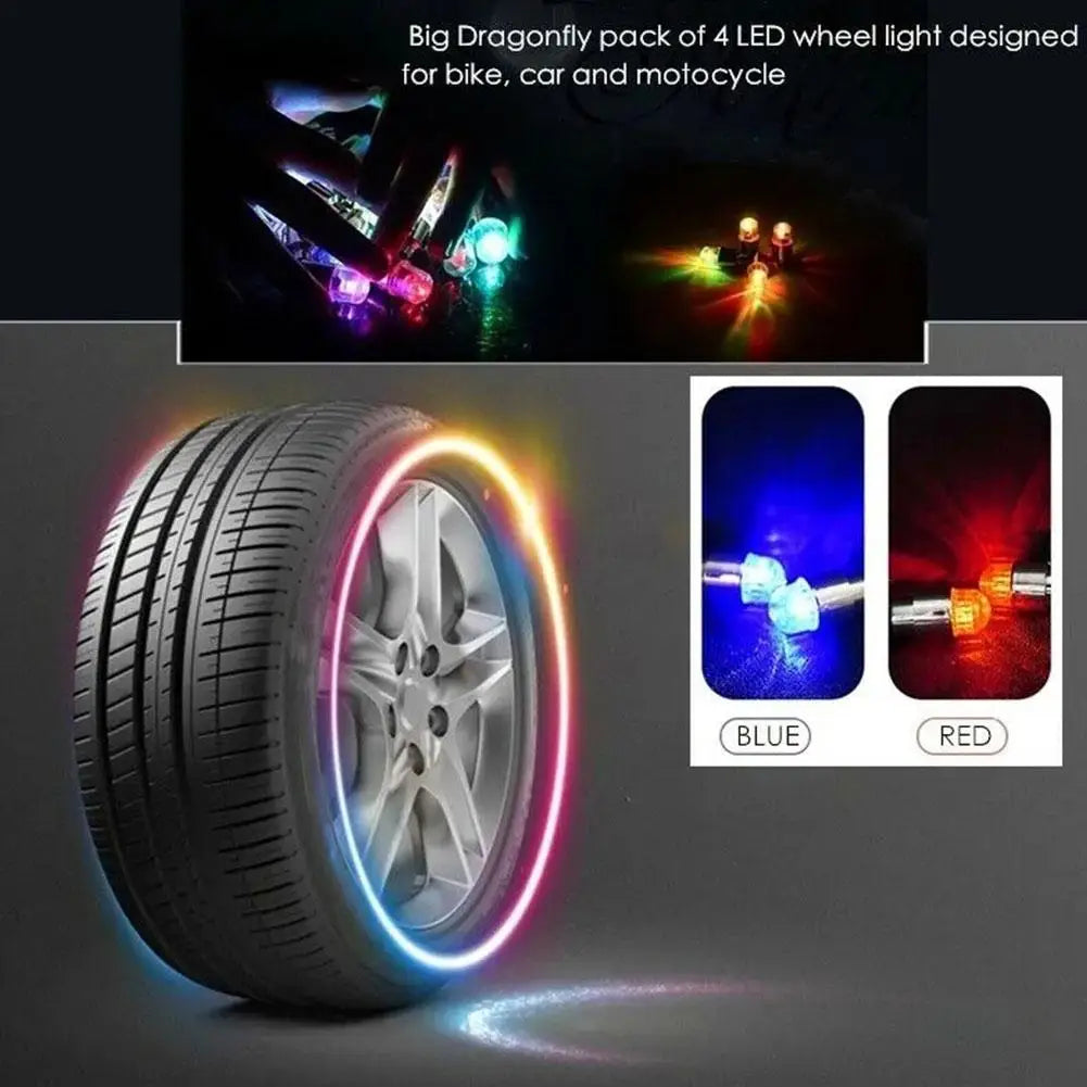 A tire with an illuminated ring light, showing blue and red LED beams.