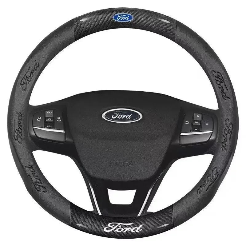 Black carbon fiber steering wheel cover for a Ford vehicle.