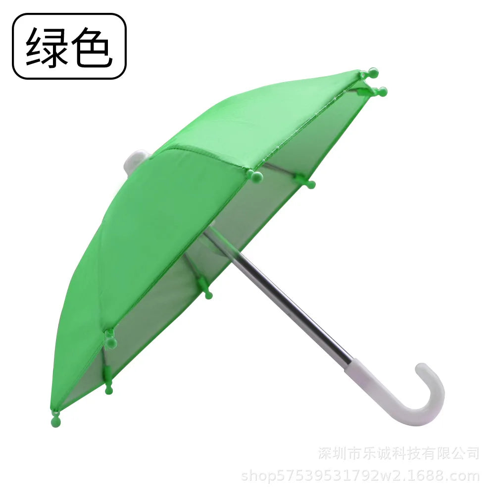A bright green mini motorcycle sunshade umbrella shown open and angled.