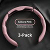 A 3-pack of Sakura Pink PU/Nappa Leather Ultra-Thin moisture-wicking antibacterial steering wheel cover.