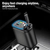 A black retractable car charger with a digital voltage display is shown plugged into a vehicle's power outlet.