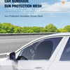 A white car side window fitted with a dark sun protection mesh installed for insulation and shade.