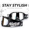 Ein Paar schwarze Motorrad- und Gelände-Goggles mit weißer Splatter-Tinte
