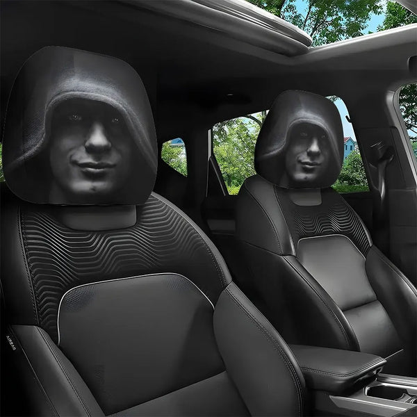 A pair of black aesthetic car headrest covers installed in a vehicle interior.