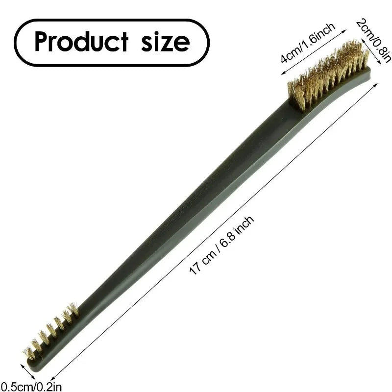 A long, dark gray detailing brush with a golden bristles and a small pick attached.