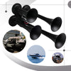 Black heavy-duty air horn system with four tubes shown alongside vehicles.