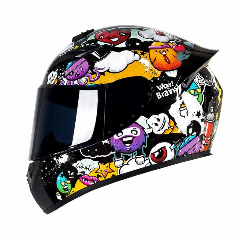 A black motorcycle helmet decorated with colorful cartoon characters and graphics.